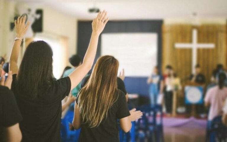 woman hands raised